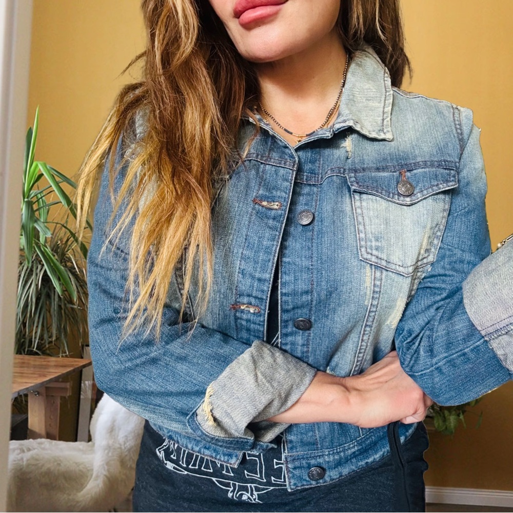 Distressed Jean jacket.
